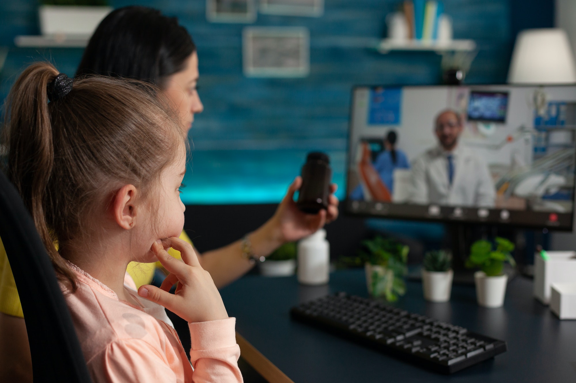 concerned-mother-talking-to-doctor-on-video-call