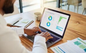 Marketing infographic, survey research and strategy planner with laptop, data planning and stock gr