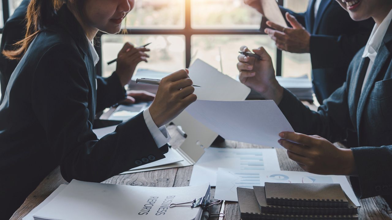 Legal strategy, business meeting, trademark disputes, corporate law, risk management