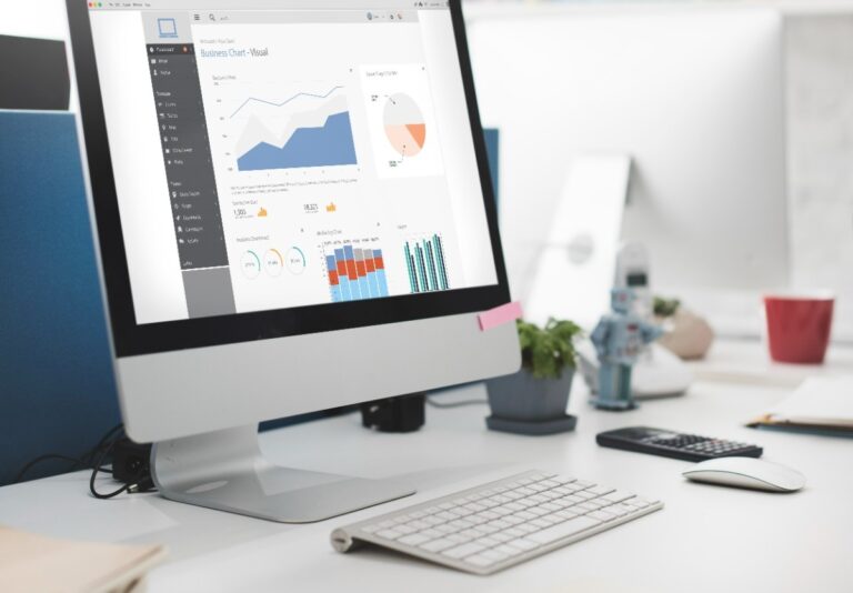 Computer screen displaying Google Search Console interface with performance charts and data