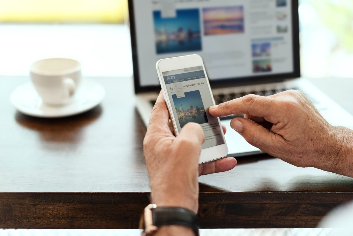 Smartphone displaying responsive website design with clean mobile interface