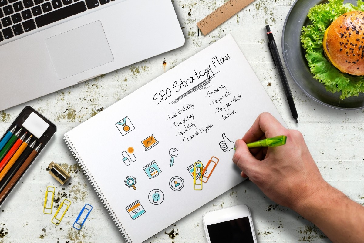 Marketing team planning SEO strategy with charts, analytics, and optimization framework